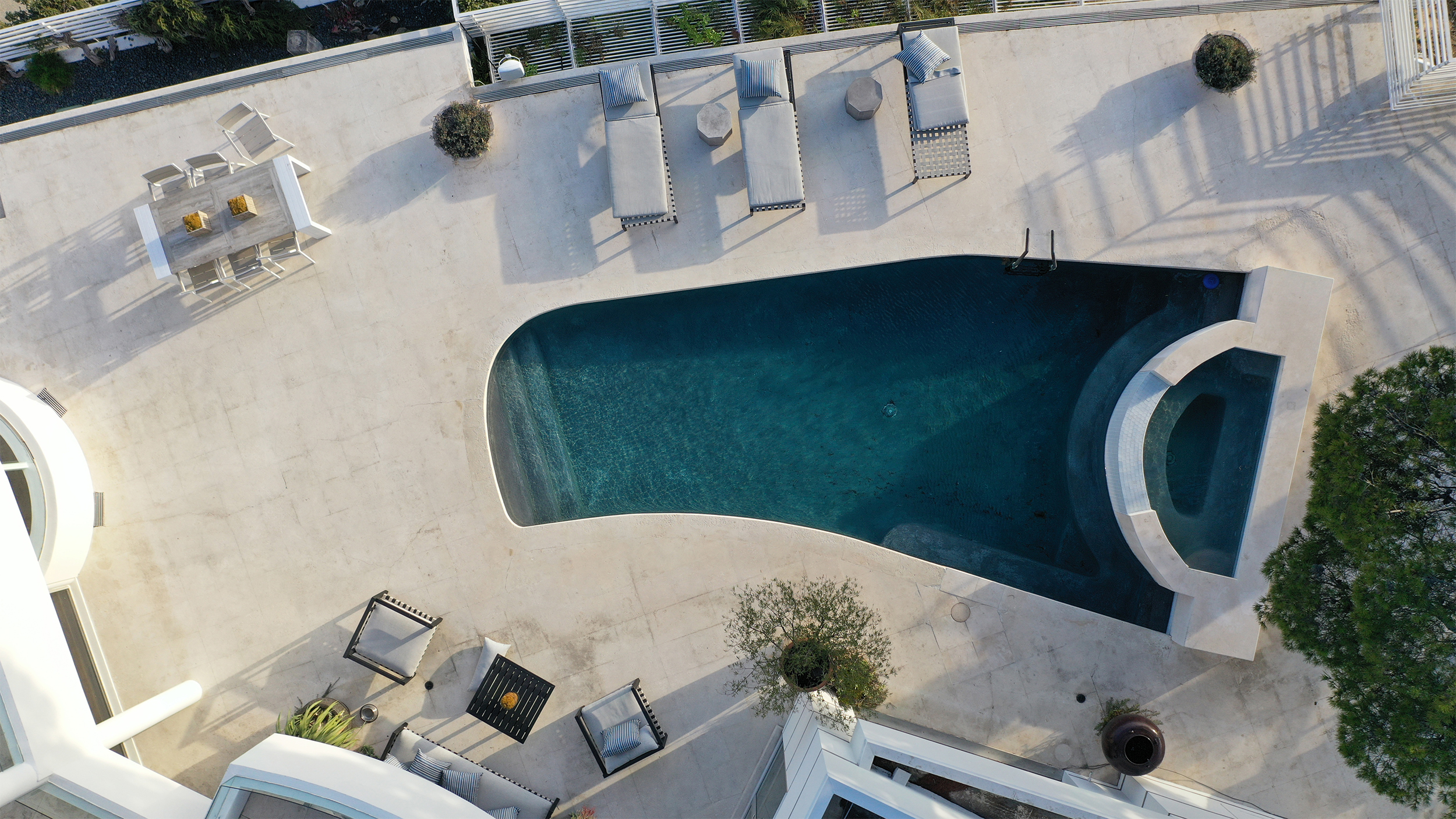 Drone photo highlighting swimming pool